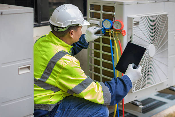 Professional Hvac technician working in Oakland City, IN